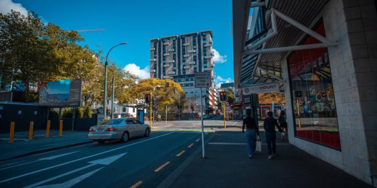 New Zealand , downturn , Economy Contracts, one-in-100-year , Record 12%, pandemic reaction.