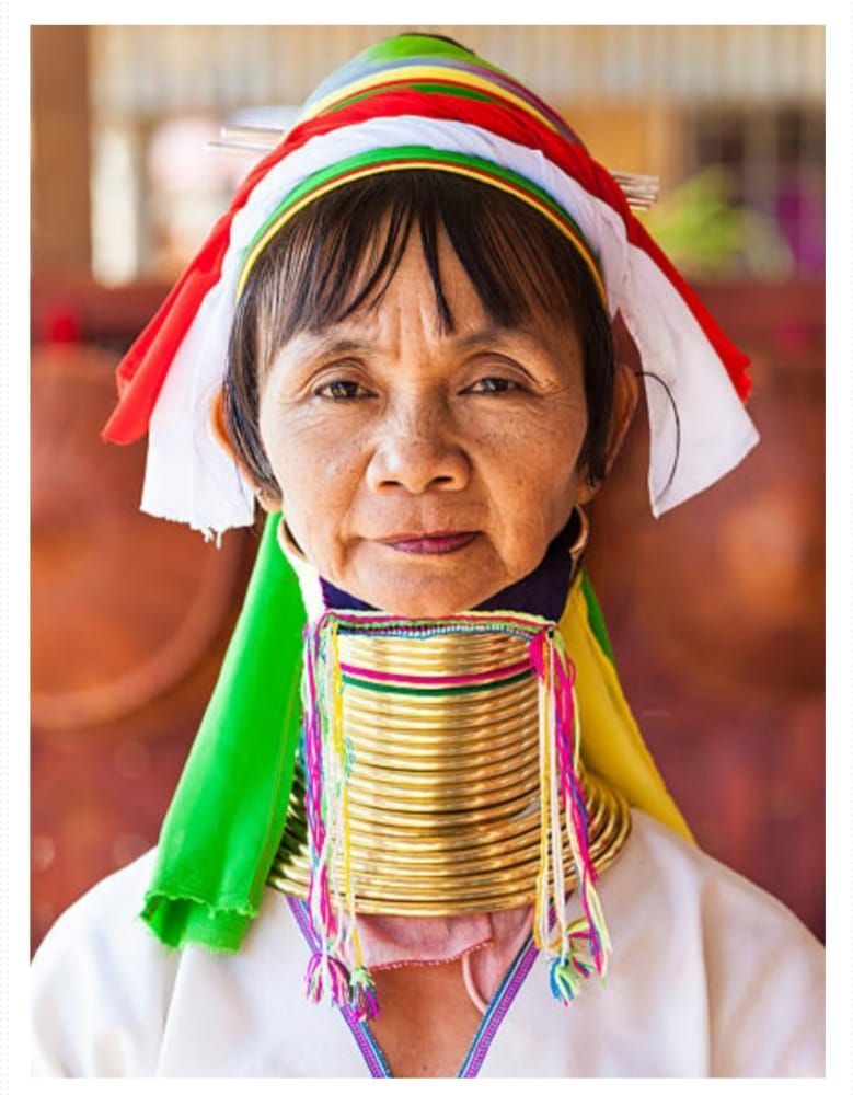 ladies and men wear these neck coils, Giraffe woman, neck coils