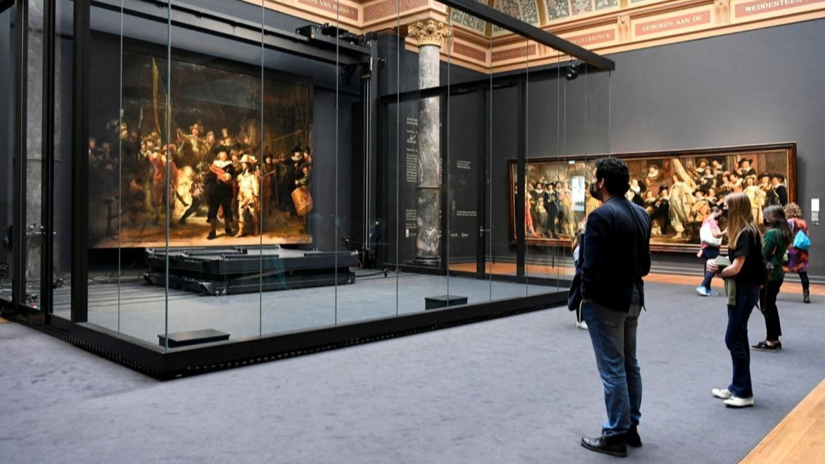 Rembrandt,  The Night Watch,  Rijksmuseum,  art restoration,  Dutch Golden Age,  Amsterdam,  varnish removal,  painting conservation,  art history,  public restoration