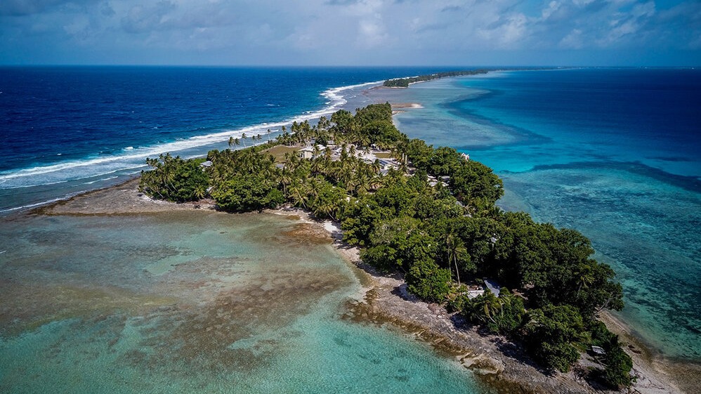 Tuvalu,  disappearing island,  climate change impact,  metaverse preservation,  rising sea levels,  Tuvalu digital twin,  cultural preservation,  virtual nation,  Pacific island nations,  climate crisis
