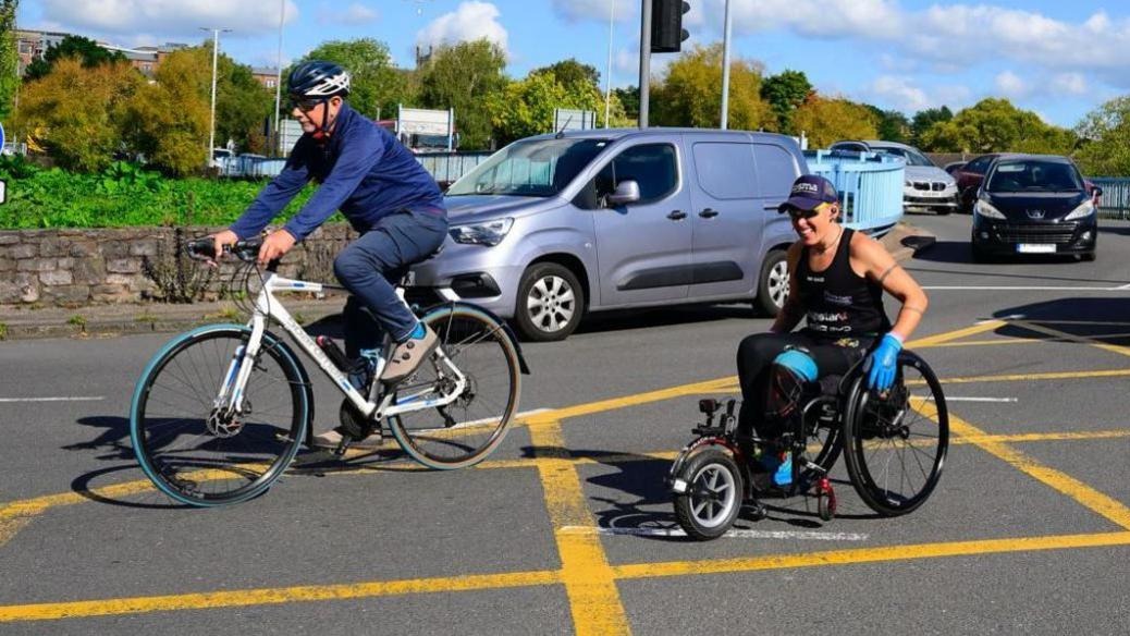 kindness of strangers,  world record,  community spirit,  generosity,  event success