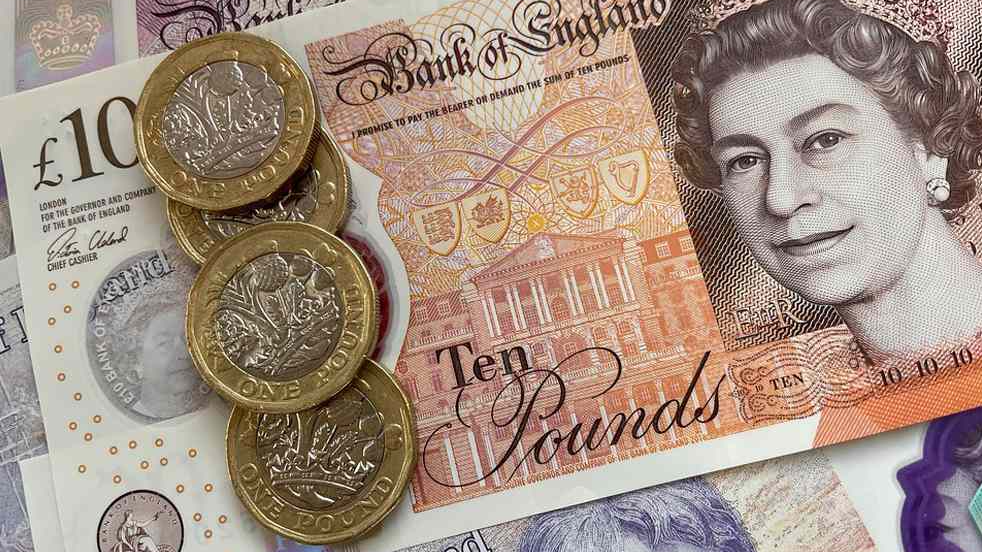 Pound decline,  UK borrowing costs,  UK economy,  tax hikes,  government spending cuts,  inflation,  economic growth,  UK bond market,  fiscal policy,  economic slowdown