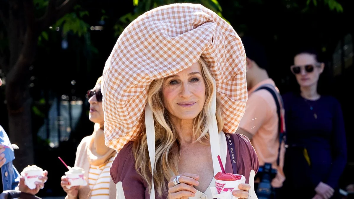 And Just Like That,  Carrie Bradshaw fashion,  bizarre TV fashion,  iconic TV outfits,  Sarah Jessica Parker style,  And Just Like That hat,  performance art fashion,  unusual TV costumes,  bold fashion choices,  fashion in TV shows