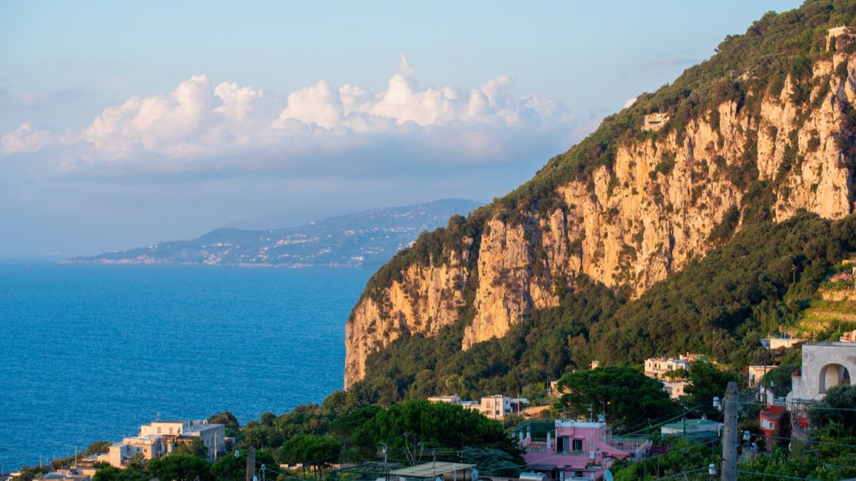 Capri hidden gems,  Anacapri travel guide,  Capri hiking trails,  Sentiero dei Fortini,  Punta Carena sunset,  Blue Grotto Capri,  Villa San Michele,  Monte Solaro chairlift,  Capri off the beaten path,  Capri vs Anacapri