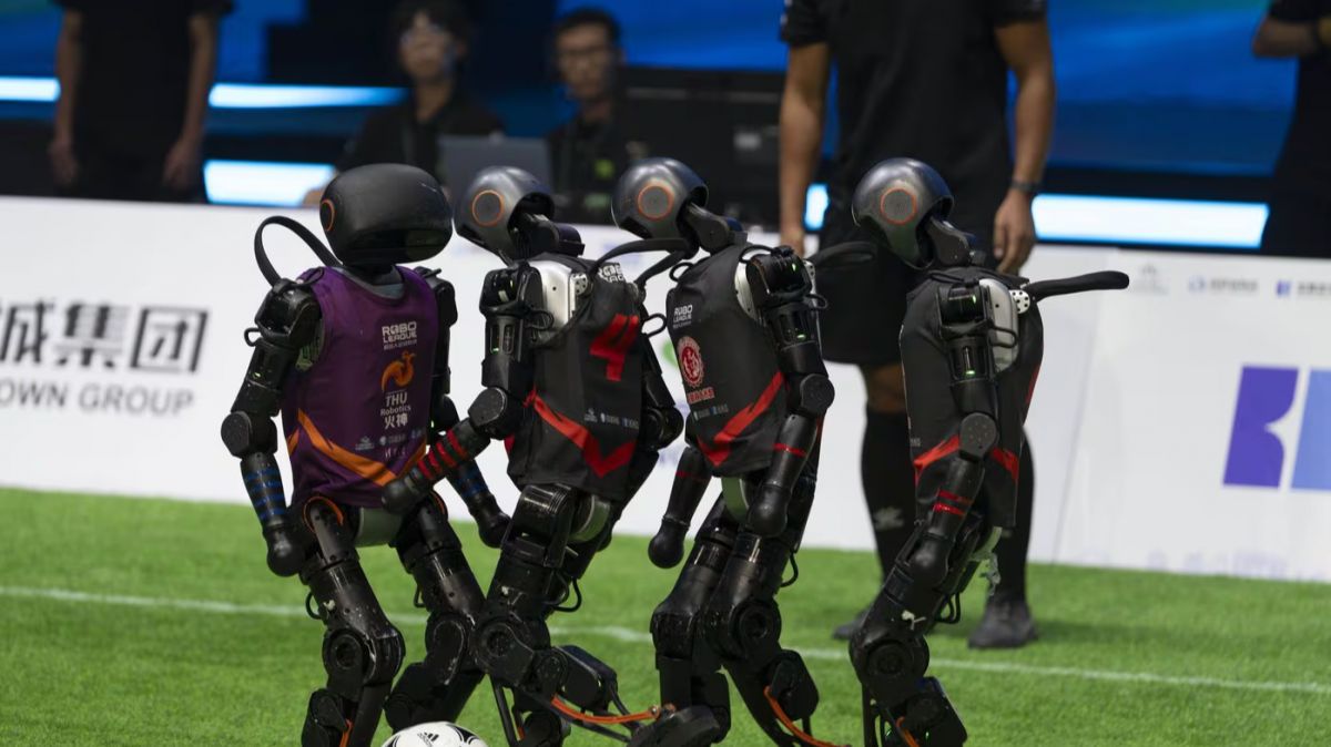 humanoid robots football match,  ROBO League China,  AI robot football,  World Humanoid Robot Games 2025,  Beijing robot tournament,  autonomous robots sports,  AI football Beijing,  robot soccer game China,  AI-driven humanoid match,  robot tech in sports