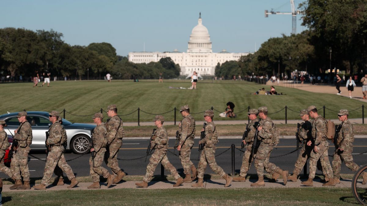 National Guard Washington DC,  DC security,  US National Guard,  Washington DC politics, controversy over National Guard deployment in Washington DC,  expanded National Guard presence political debate,  reasons behind National Guard expansion in DC,  impact of prolonged Guard deployment on civil liberties,  federal vs local authority in National Guard decisions, Donald Trump