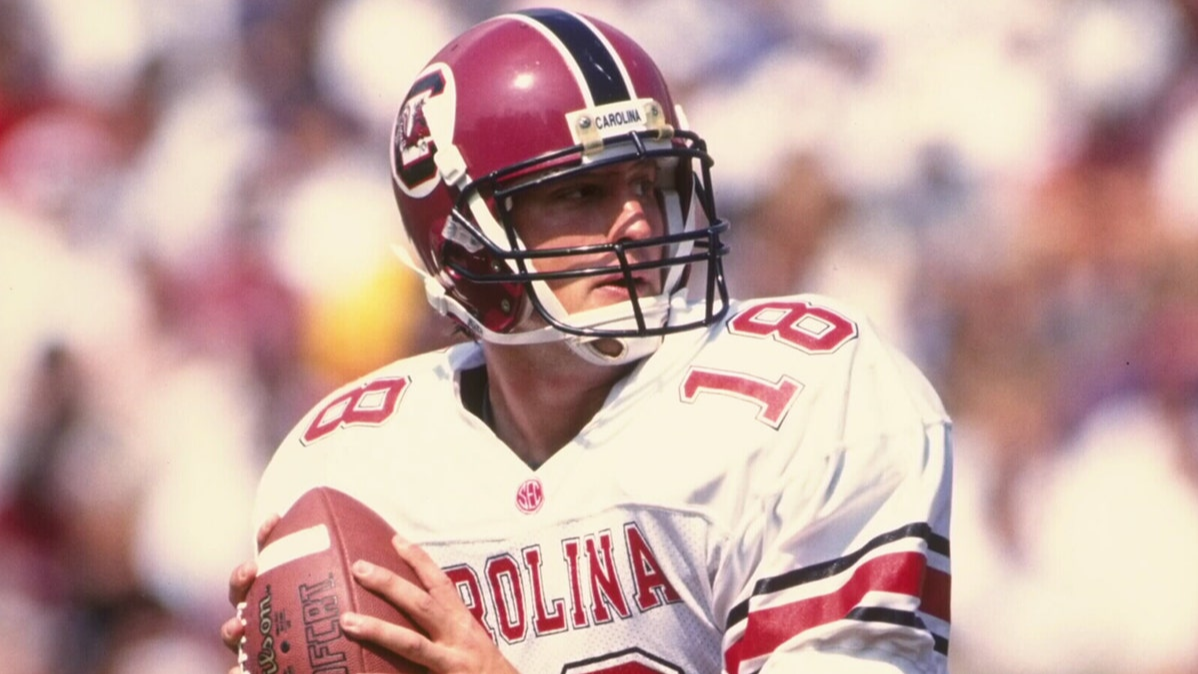 Steve Taneyhill,  South Carolina Gamecocks,  home run celebration, Clemson vs Carolina, how Steve Taneyhill defined Clemson vs Carolina rivalry,  impact of Taneyhill home run swing celebration,  analysis of 1990s Clemson Carolina rivalry moments,  Steve Taneyhill midfield signature significance,  iconic celebrations in college football rivalries