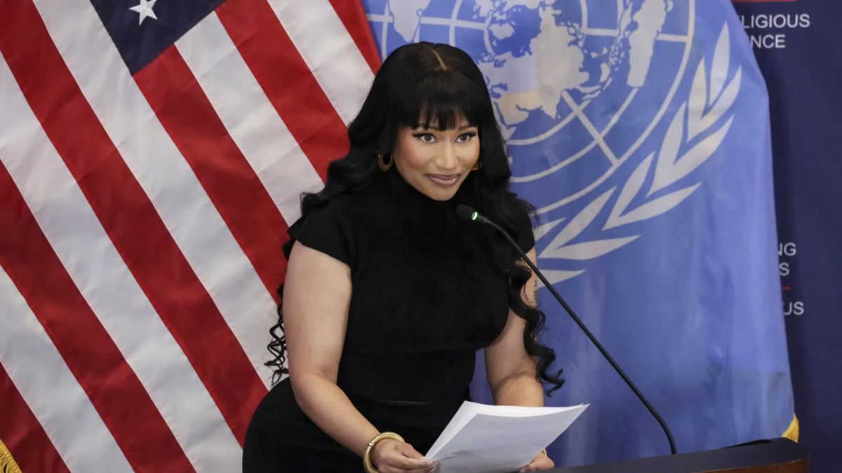 Nicki Minaj AmericaFest 2025,  Erika Kirk Turning Point USA,  Trump and Vance role models,  Nicki Minaj JD Vance assassin comment, Nicki Minaj, examining Nicki Minaj public reversal on immigration policies,  analysis of Nicki Minaj changing stance on border issues,  reasons behind Nicki Minaj policy reversal,  public response to Nicki Minaj immigration comments,  comparison of Nicki Minaj past and present policy views