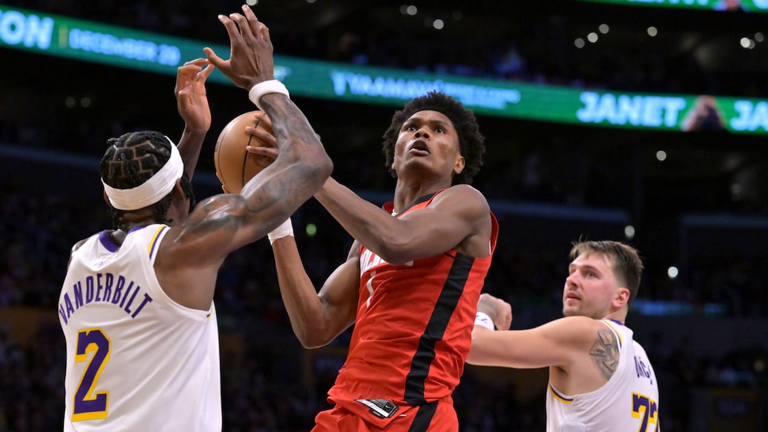 Houston Rockets vs Lakers Christmas 2025,  Amen Thompson 26 points vs Lakers,  Kevin Durant Rockets Christmas highlights,  Luka Doncic return vs Rockets stats,  Lakers third straight loss December 2025,  Alperen Sengun rebounds vs Lakers,  Rockets wire to wire win Christmas,  LeBron James Christmas Day scoring record,  Austin Reaves calf injury update,  NBA Christmas Day 2025 game results