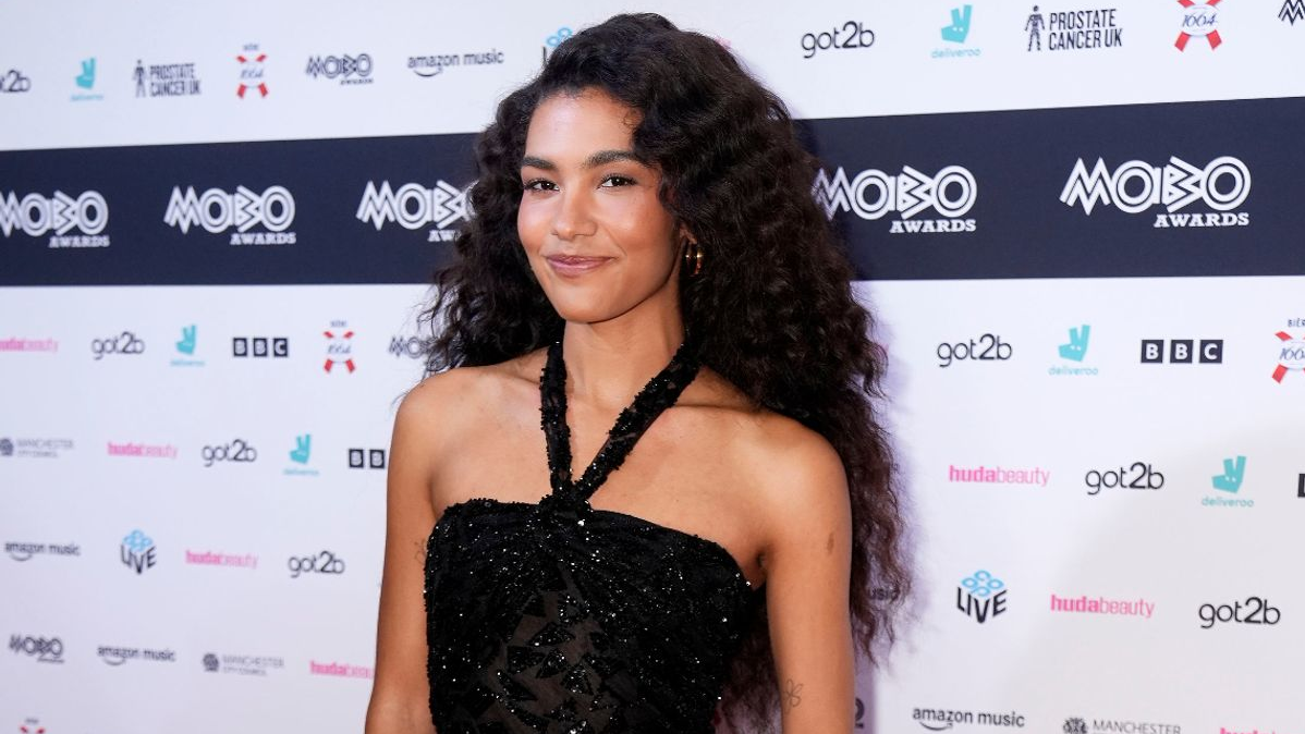Olivia Dean MOBO Awards 2026,  Olivia Dean triple win,  MOBO Awards Manchester 30th anniversary,  Olivia Dean Messy album,  UK music awards news,  British singer Olivia Dean,  MOBO winners list 2026,  R&B UK artists news,  Olivia Dean success story